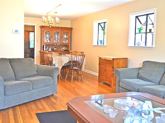 Neutral colors, hardwoods, unique windows