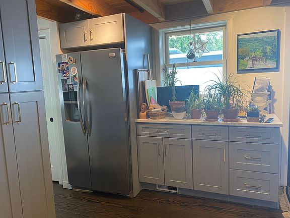 Many cabinets and television in kitchen! Okay