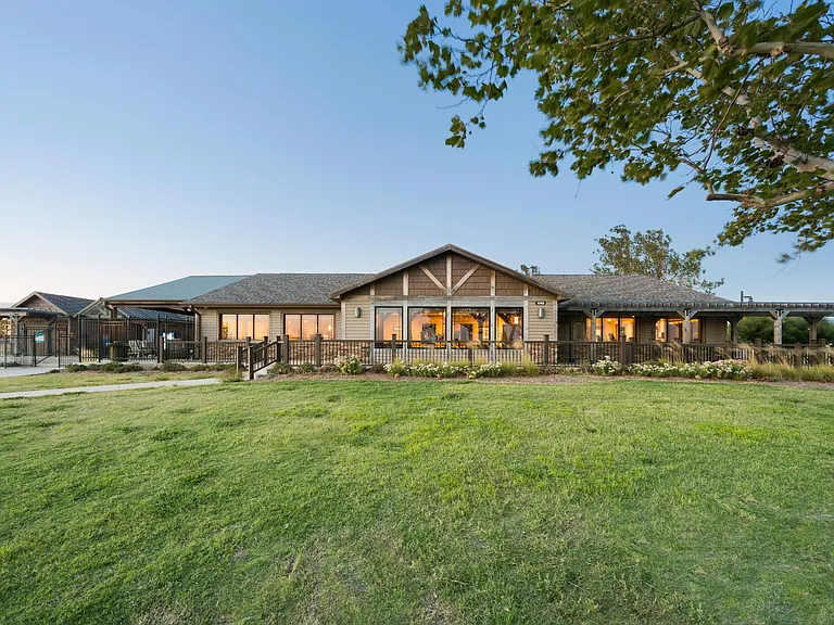 Buffalo Soldier Acres Community Center with gym, business center, multi-purpose room that includes a kitchen, an outdoor splash pad, outdoor entertainment area with firepit and grill. It also includes a dog park.