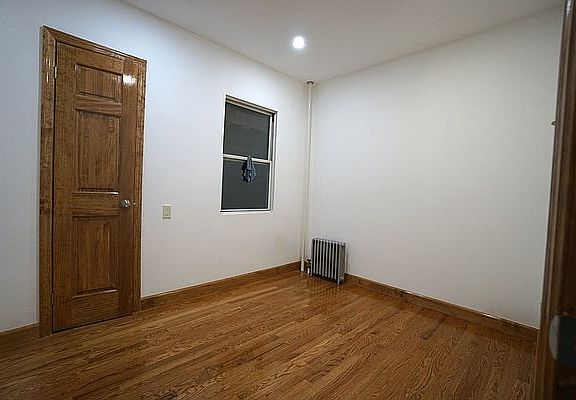 5th image of 261 E 10th St APT 3