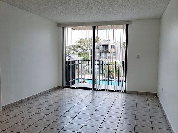 Living Room leading to spacious Balcony