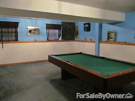 Recreation Room
						:
						finished basement, pool table & accessories negotiable, daylight windows