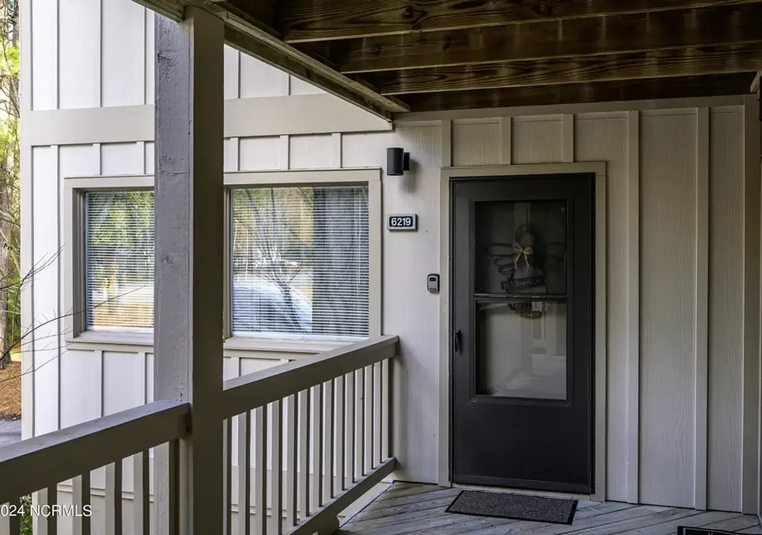 **Light-Filled Condo with Designer Finishes | Screened Porch — Photo 2
