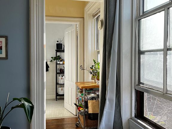 Hallway to kitchen and bath