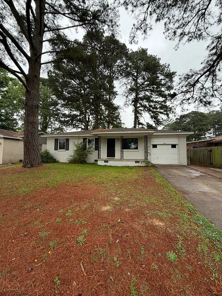 Cozy Single-Story Home with Attached Garage & Fenced Backyard — Photo 1