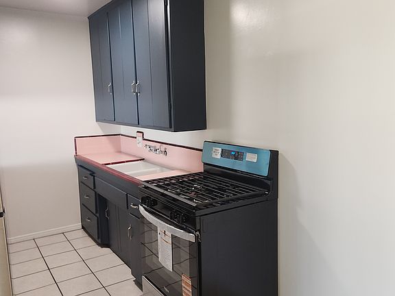 Kitchen with new stainless gas stove
