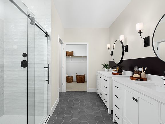 Primary bath with glass shower enclosure