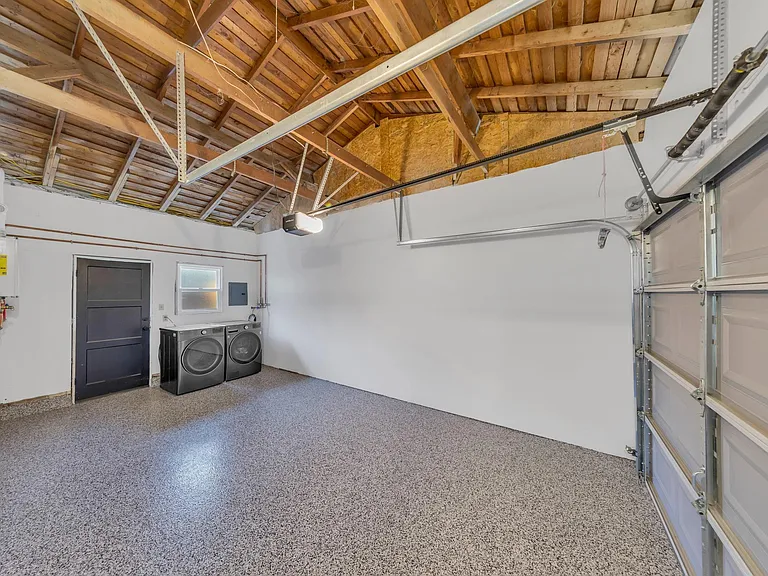 Private garage parking with washer & dryer.