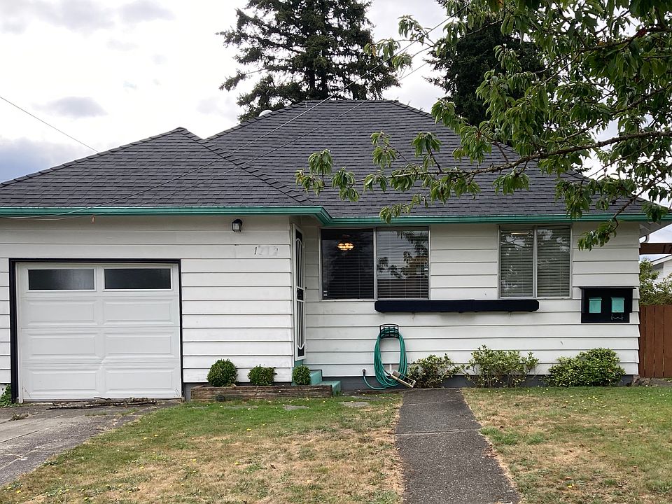 Late '40's bungalow with fence backyard.