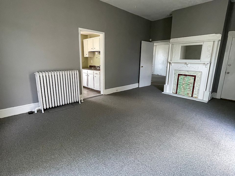 Living room with mantle