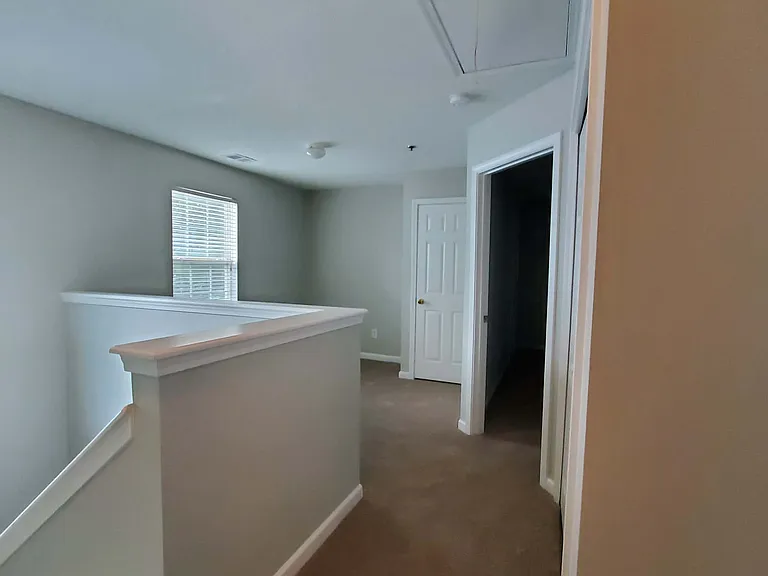 Upstairs open loft perfect for home office, reading nook, or play area!