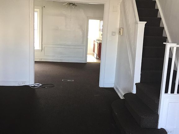 Straight through picture of the living room and dining room
