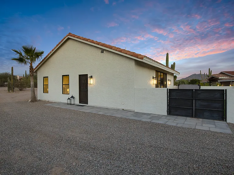 West side of home and patio gate