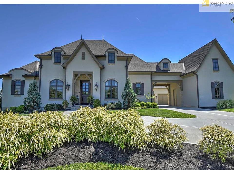 Simply stunning custom Gianni build 1.5 story, 5 bedroom home on 1.4 acre lot.