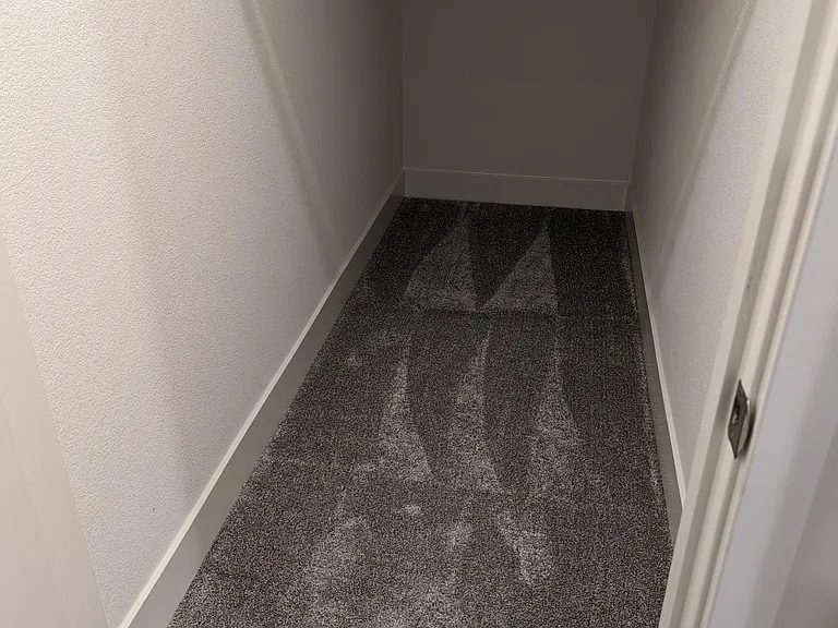 Storage area under the steps.