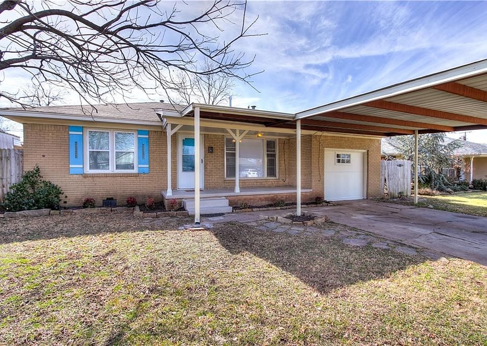 2104 SW 61st Street - Charming Cottage. Home has new energy efficient windows all around house except for large picture window in front.