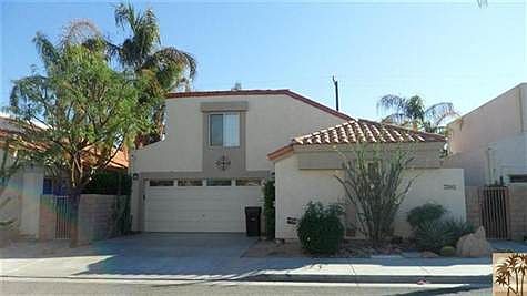 Beautiful two level home with separate gated entry.