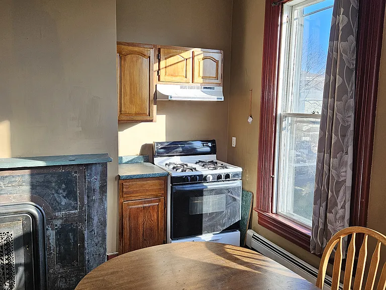 Kitchen with Marble Fireplace