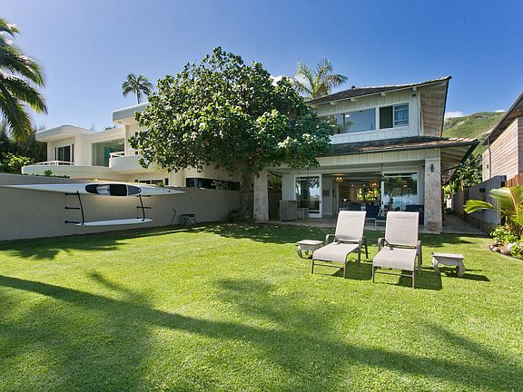 View of back yard and house