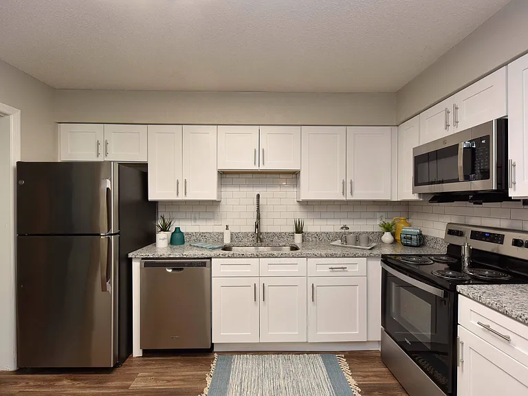 Wood Style Flooring and New Cabinetry, Granite Counters, Stainless Appliances