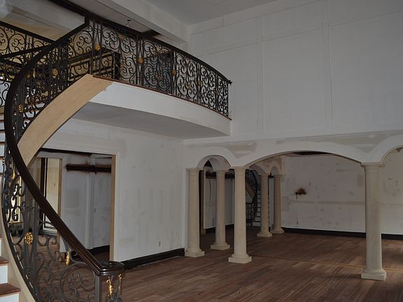 BALCONY LOOKING DOWN TO THE MAIN HALL 