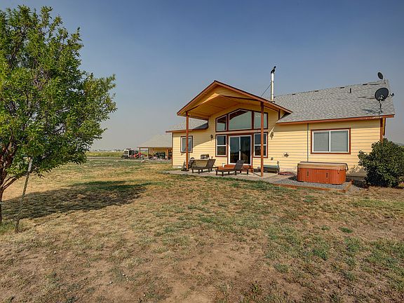 Back of custom home facing Cascade Mtns
