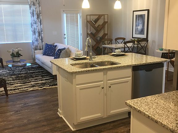 kitchen open to living/dining area