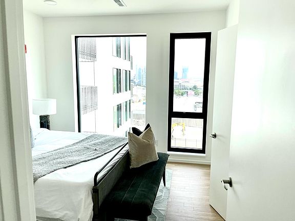 Bedroom with city view.