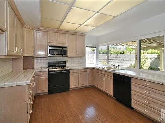 OLD PICTURE OF KITCHEN. It has been upgraded