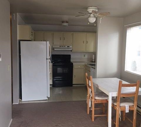 Open Concept kitchen opens to living and dining room