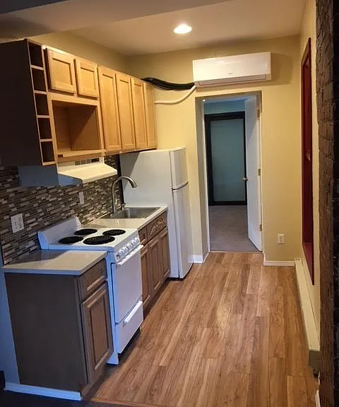 Efficient kitchen with new appliances.