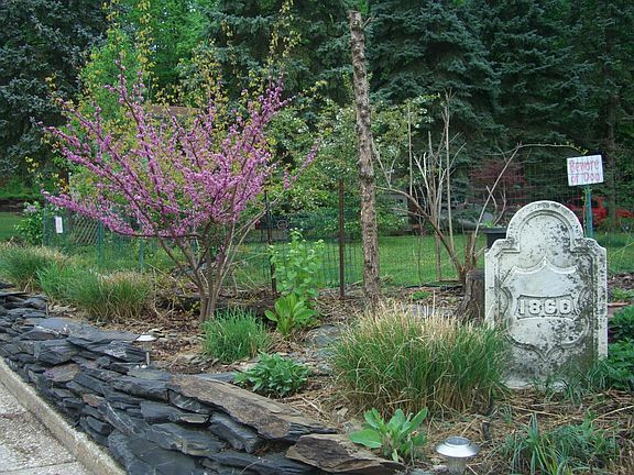 Not a headstone...a marker! The house was built in 1860. It 