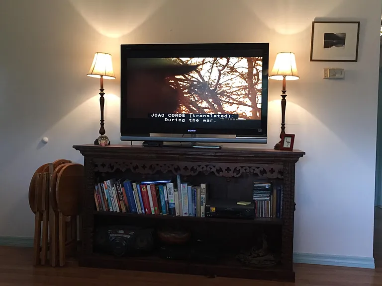 View of TV from couch opposite it
