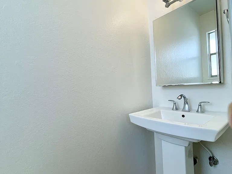 Half bath in the primary suite