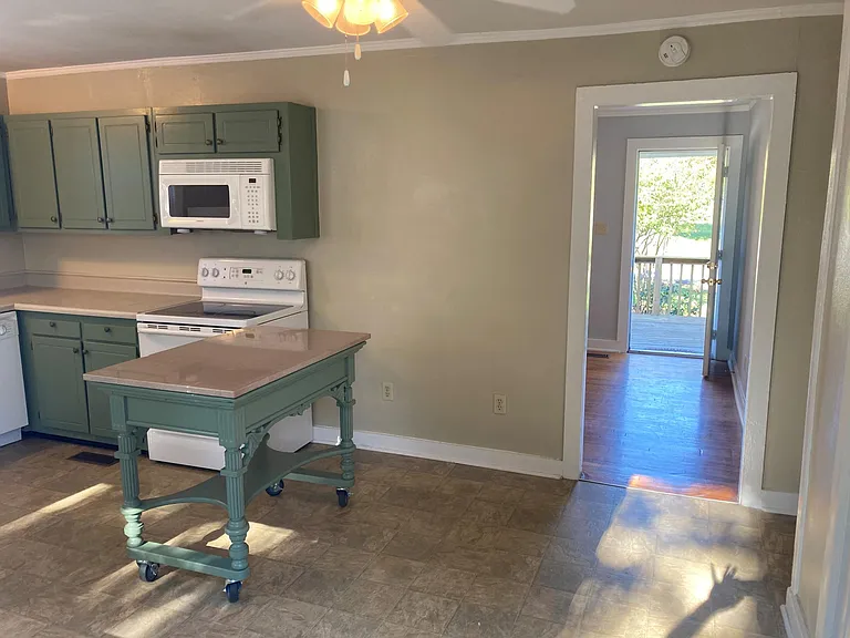 Floating kitchen work station with granite top.