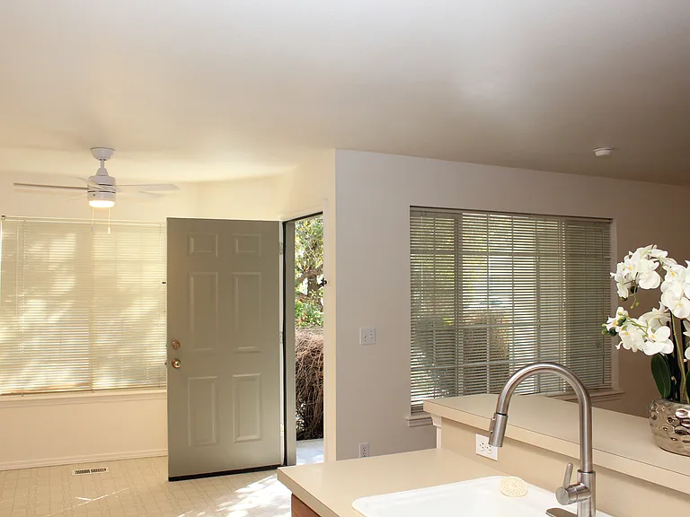 Door off Dining Area to Private Patio & Storage Area.