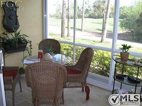 Travertine tile on the lanai over looking the 8th hole.  Lanai alo has vinyl windows for year around enjoyment.