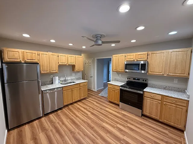 Brand new Kitchen, lots of light and cabinets. Eat in kitchen easily fits a table & chairs. Recessed lighting & fan. Granite countertops, Stainless Steel appliances, refrigerator, electric stove, microwave, dishwasher. All new Moen fixtures.