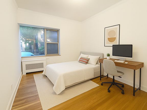 2nd image of 412 E 50th St APT 1A