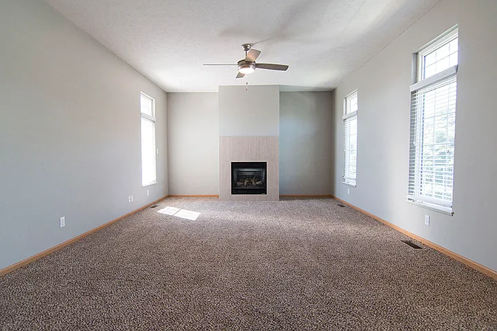 Our spacious living rooms have large windows and cozy fireplaces.