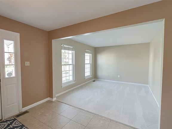 Carpet new in July 2019, Beautiful tile entry...looking into the office/music/bonus room
