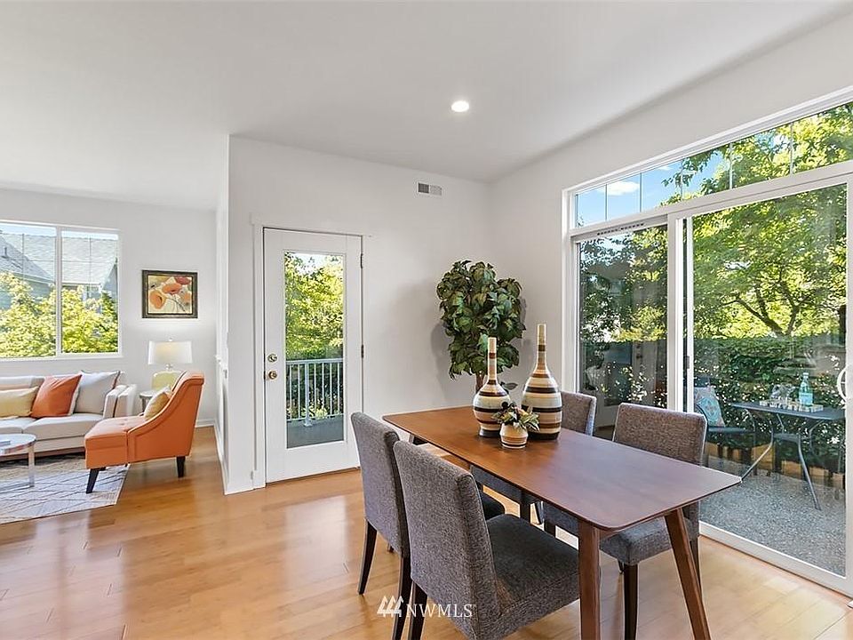 dining space with lot of natural light and view of private patio