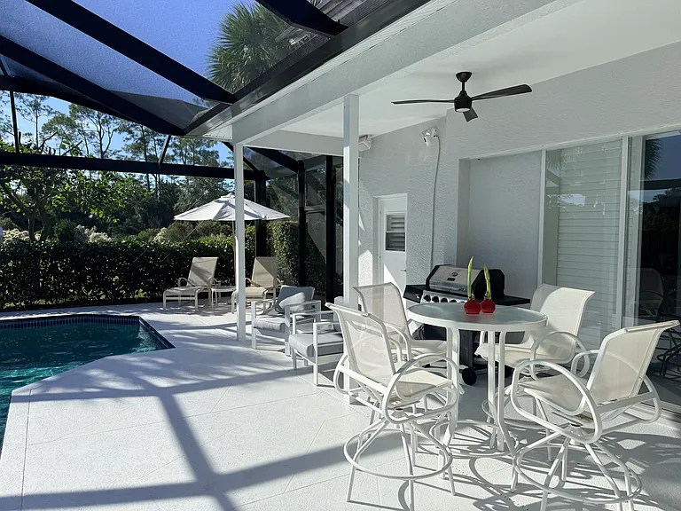 Outdoor dining high top and lounge chairs