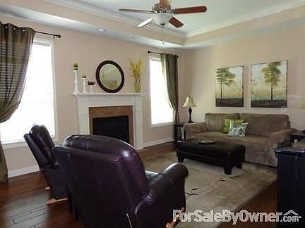 Living Room
						:
						Hardwood floors, 10 ft. tray ceiling
