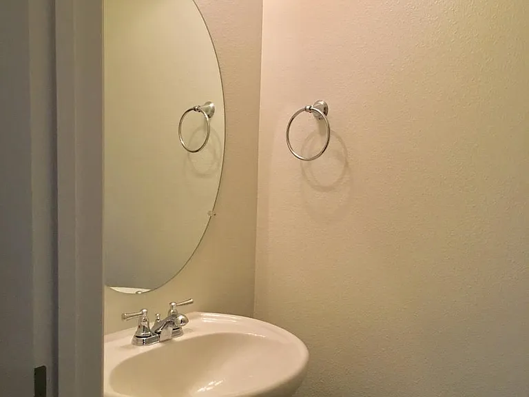 Half bath on the first floor with a nice pedestal sink.