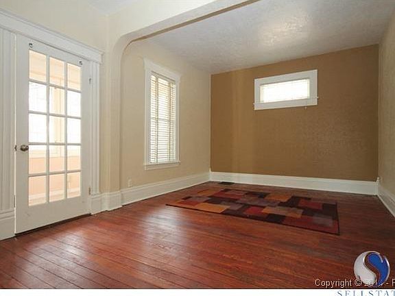 Living area with enclosed front porch!