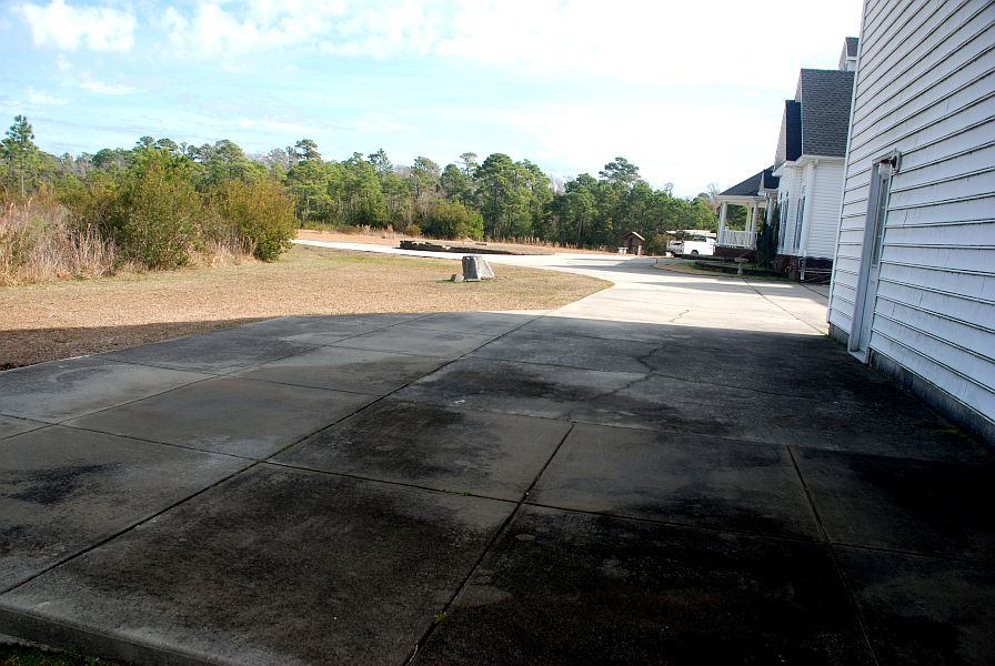 Your concrete parking area... enough for truck & compact car.