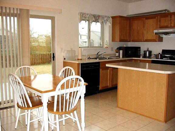Kitchen area, floor is now replaced with vinyl plank flooring, same as all other areas in the first floor.