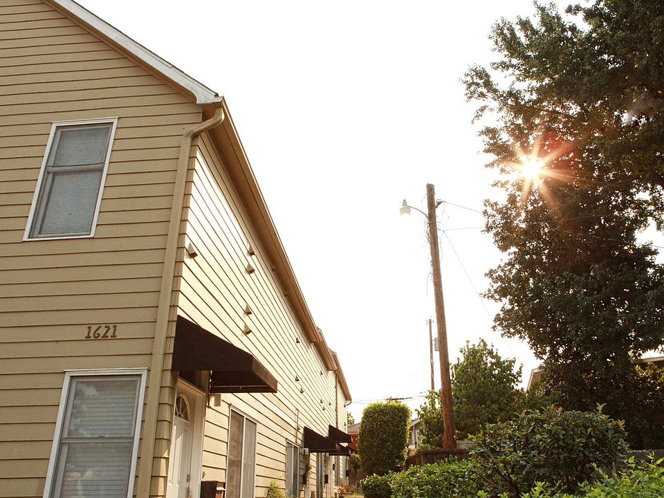 Front view of Condo Units, 1621 S Quaker Ave., Tulsa, OK 74120 showing safety street light paid by HOA.