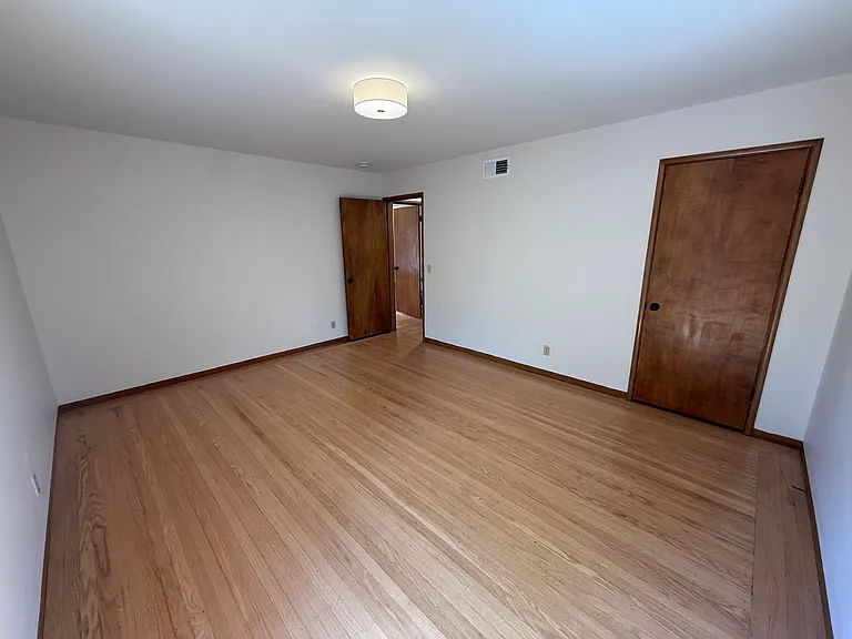 Bedroom #1 has 2 windows and 2 closets.